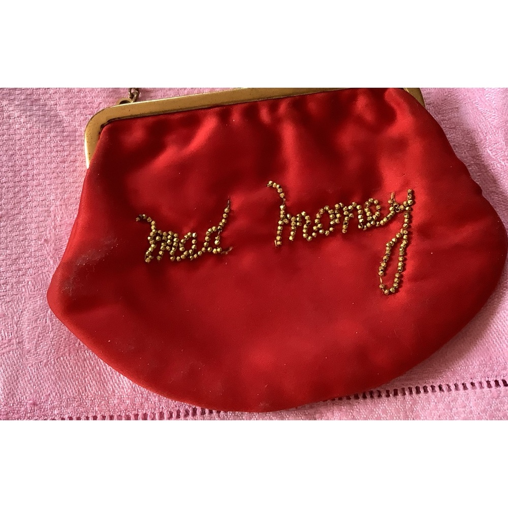 Vintage red satin-y evening purse..with gold beading reads “ mad money”